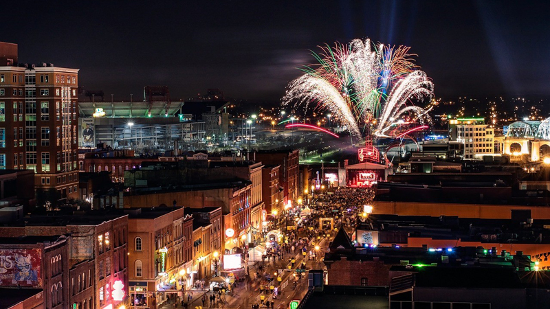 Rowdy Bus - Black luxury shuttle with passengers enjoying the ride through downtown Nashville