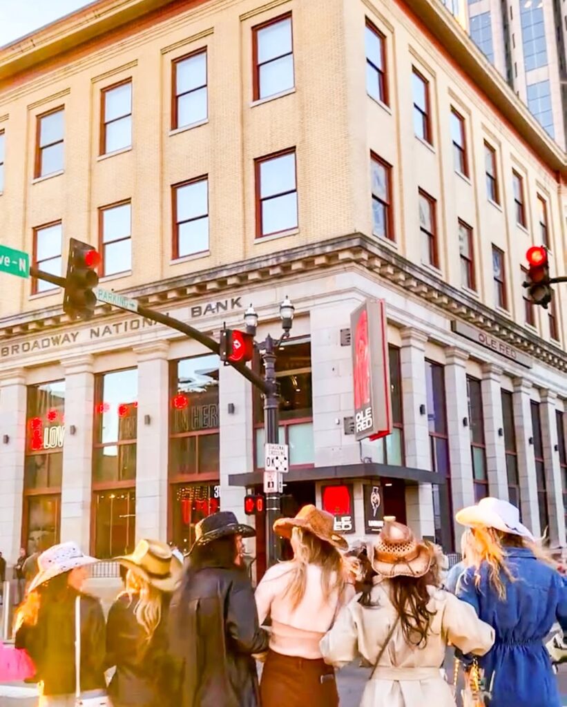 Exterior view of Ole Red Nashville with its signature red signage on Broadway.